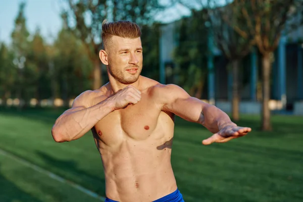 Man in the park workout outdoor exercise — Stock Photo, Image