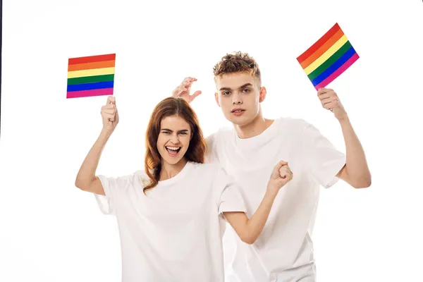 Jong paar lgbt vlag transgender lifestyle licht achtergrond — Stockfoto