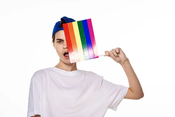 Woman wearing white t-shirt lgbt flag inventor community — ストック写真