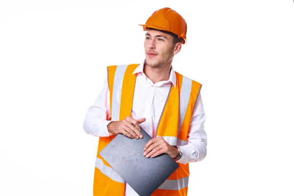 Uomo in arancio hard hat ingegnere lavoro professionisti costruzione — Foto Stock