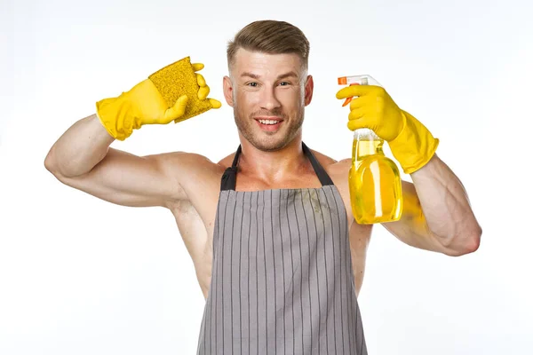 Deportivo musculoso hombre con detergente limpieza posando — Foto de Stock