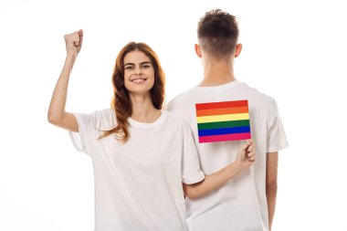 Genç çift lgbt Bayrak transseksüel topluluk ışığı arka planı