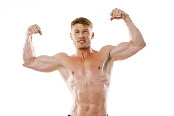 Férfi sportoló felpumpált izmos test pózol fitness — Stock Fotó