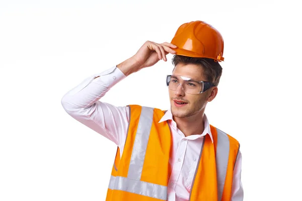 Man in work uniform orange helmet safety professional work — Stock Photo, Image