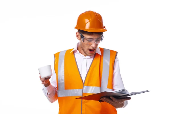 Ingeniero naranja protección uniforme documentos trabajo profesional —  Fotos de Stock