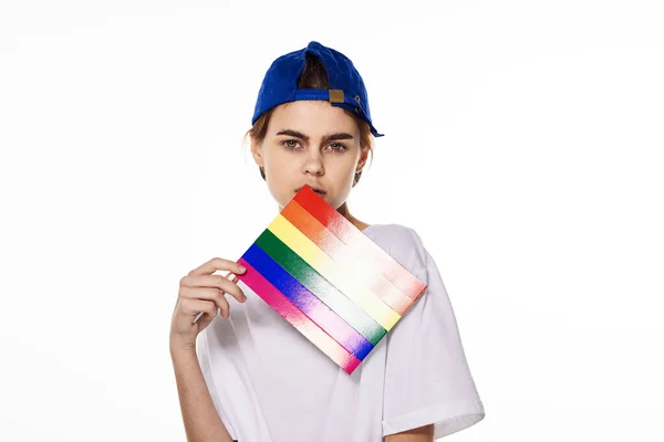 Woman wearing white t-shirt lgbt flag inventor community — ストック写真