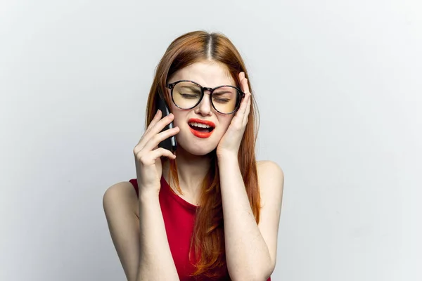Pretty woman with glasses talking on the phone technology lifestyle — Stock Photo, Image
