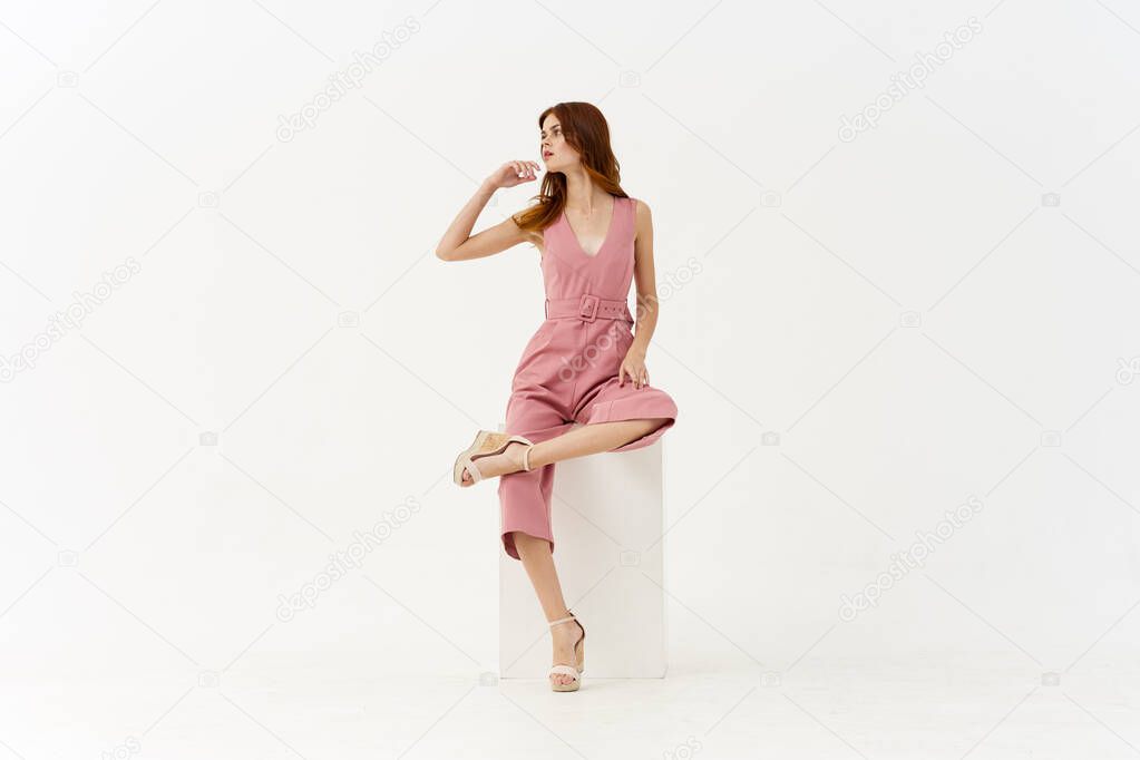 pretty woman in pink dress decoration posing model