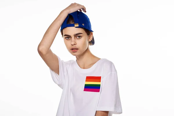 Woman wearing white t-shirt lgbt flag inventor community — ストック写真