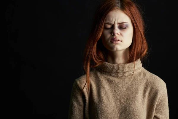 Red-haired woman with bruises under her eyes scared crying depression — Stock Photo, Image