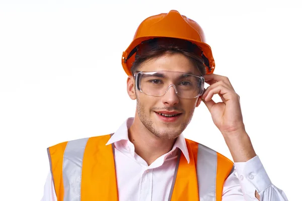 Man in work uniform orange helmet safety professional work — Stock Photo, Image