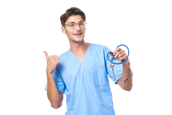 Man in medisch uniform patiënt behandeling ziekenhuis geneeskunde studio levensstijl Stockfoto
