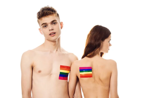 Coppia in t-shirt bianche Bandiera lgbt minoranze sessuali transgender — Foto Stock