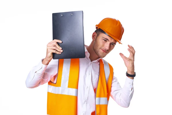 Obrero en naranja uniforme posando construcción — Foto de Stock
