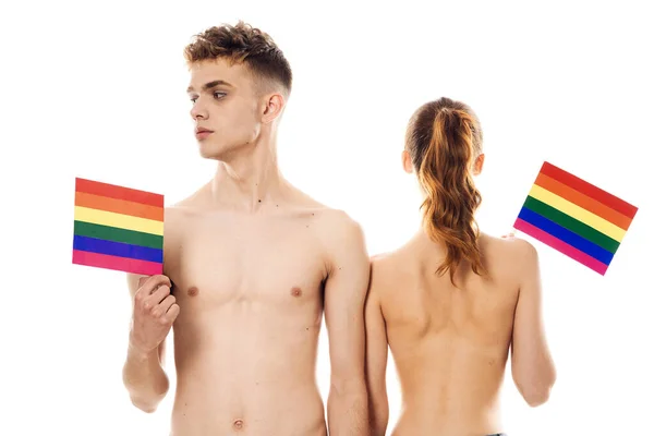 Couple Drapeau lgbt transgenre minorités sexuelles lumière arrière-plan — Photo