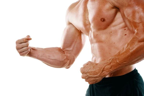 Man med en pumpad upp muskelmassa närbild träning bodybuilders — Stockfoto