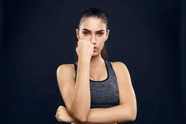 Sportive woman workout equipment gymnasium lifestyle black background — Stock Photo, Image