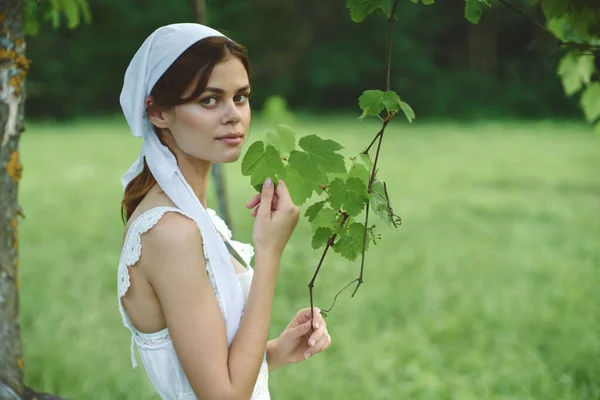Cheerful woman outdoors in the garden countryside ecology nature — Stock Photo, Image