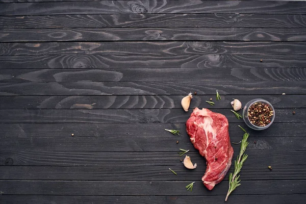 Meat beef rosemary steak ingredients wooden table — Stock Photo, Image