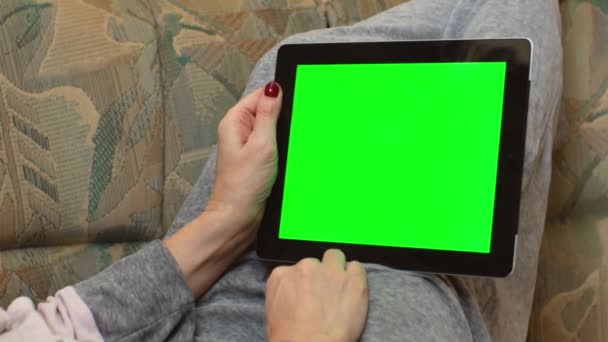 Adult Woman Holding Tablet Computer Green Screen Lies Sofa Home — Stock Video