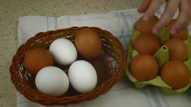 Close Childs Hand Transferring Chicken Eggs Green Cardboard Container Wicker — Vídeo de Stock
