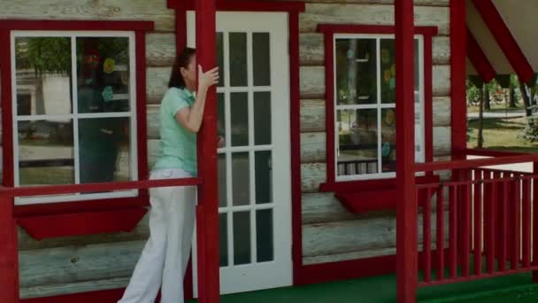 Woman Beautiful White Trousers Poses Porch Small Beautiful House Country — Stok Video