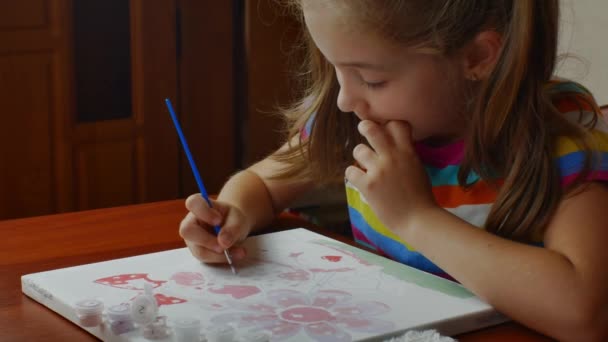 Girl Sitting Table Enthusiastically Draws Brush Watercolor Paints White Canvas — Stock video