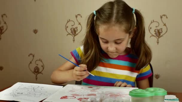 Pretty Little Artist Paints Watercolor White Paper While Sitting Table — Vídeos de Stock