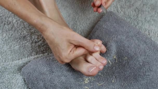 Woman Polishes Her Nails Nail File Beautiful Nail Care Process — Stockvideo