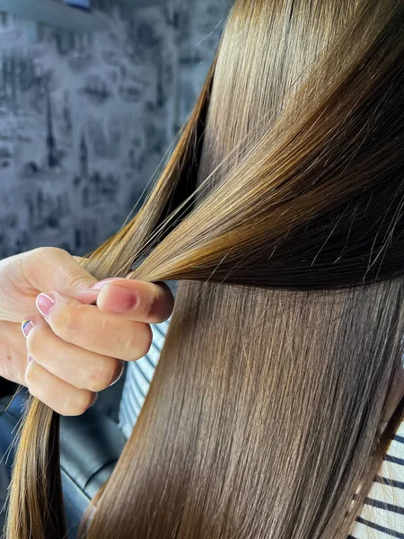 master of cosmetology works with a client. High quality photo