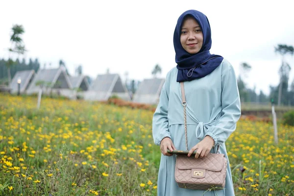 Beautiful muslim girl is outside