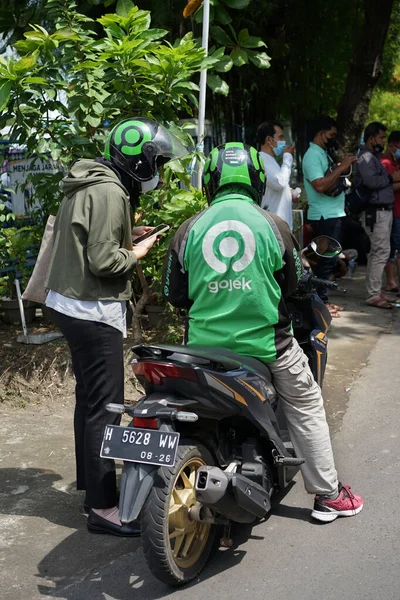 Online motorcycle taxi drivers are waiting for passengers