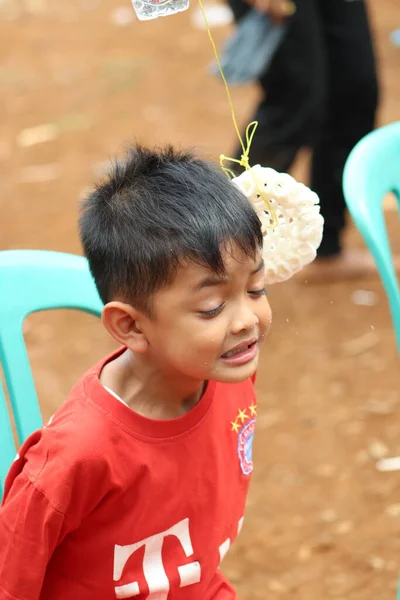 Cracker eating competition to commemorate Indonesia's independence day
