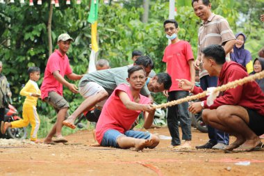 Tug of war competition to commemorate the anniversary of Indonesia's independence