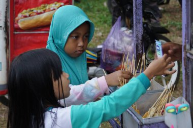 Kids are paying for snacks