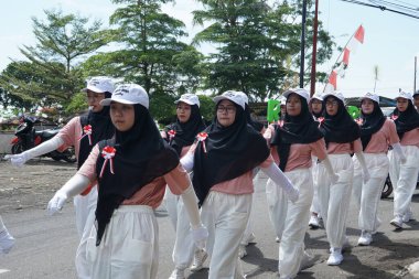 Participants of the walking competition in commemoration of the 77th Indonesian Independence Day