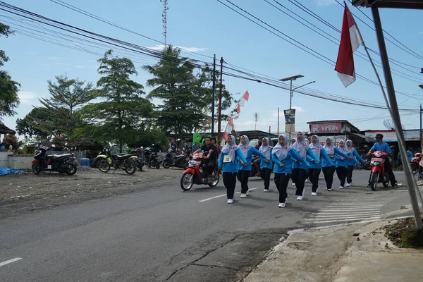 Participants of the walking competition in commemoration of the 77th Indonesian Independence Day