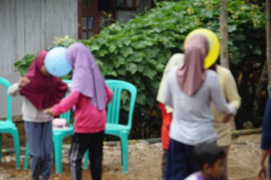 Endonezya 'nın 77. Bağımsızlık Günü' nü kutlamak için topu kafa kullanarak tutmanın bulanık konsepti.