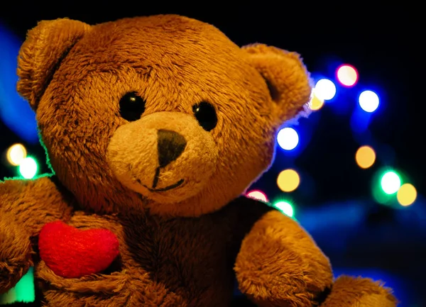 Brown Teddy Bear Close Background Garland Lights Bokeh Fotos De Bancos De Imagens