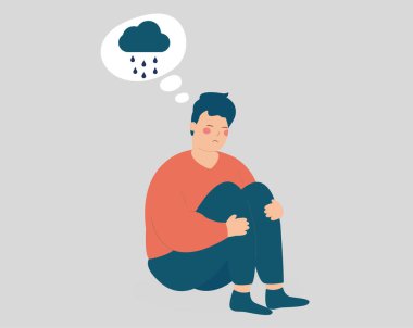 Üzgün adam dizlerini yağmurlu bulutlarla kucaklıyor. Mutsuz çocuk yerde oturuyor ve stresli ve depresif görünüyor. Psikolojik sorunları olan bir erkek depresyona girer. Zihinsel sağlık bozuklukları kavramı.