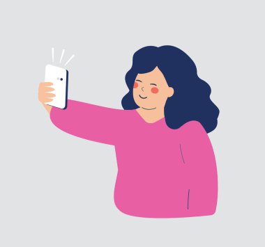 Akıllı telefonuyla selfie çeken genç bir kadın. Sosyal medya bağımlısı bir kız ve sanal arkadaşlarıyla görüntülü görüşme yapıyor. Telefon görüşmesi ve uzun mesafeli ilişkiler kavramı