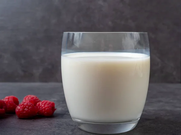 Glass Milk Raspberries Gray Table — ストック写真