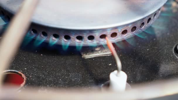 Gas hob. Gas stove burner. Ignited gas burner. — Stock Video