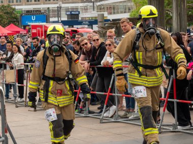 Germany, Berlin 05/14/2022. 10th Berlin Fire Stair Run. Running firefighters.