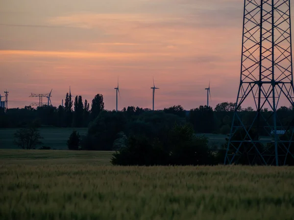 Pillars High Voltage Wires Sunset — стоковое фото