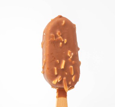Chocolate Ice Cream with almonds on a stick. Ice cream on a white background.