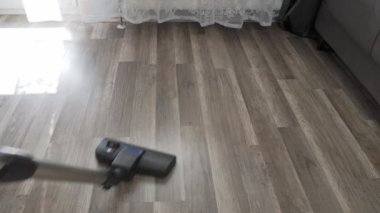 Vacuuming the floor. House cleaning. High quality 4k footage