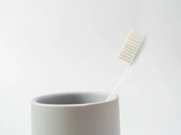 Toothbrushes Glass Copy Space White Background — Stock Photo, Image