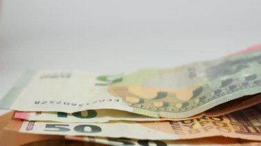 Euro bills and coins. Cash. The concept of savings. High quality 4k footage