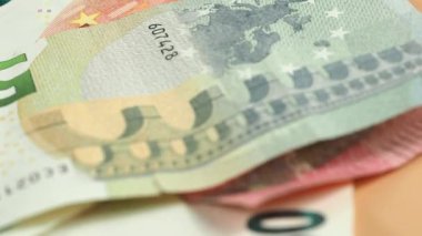 Euro bills and coins. Cash. The concept of savings. High quality 4k footage
